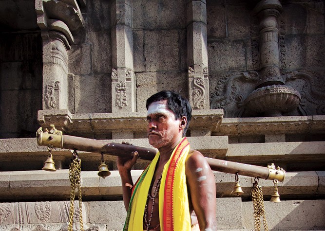 A Tamil Priest with Kavadi