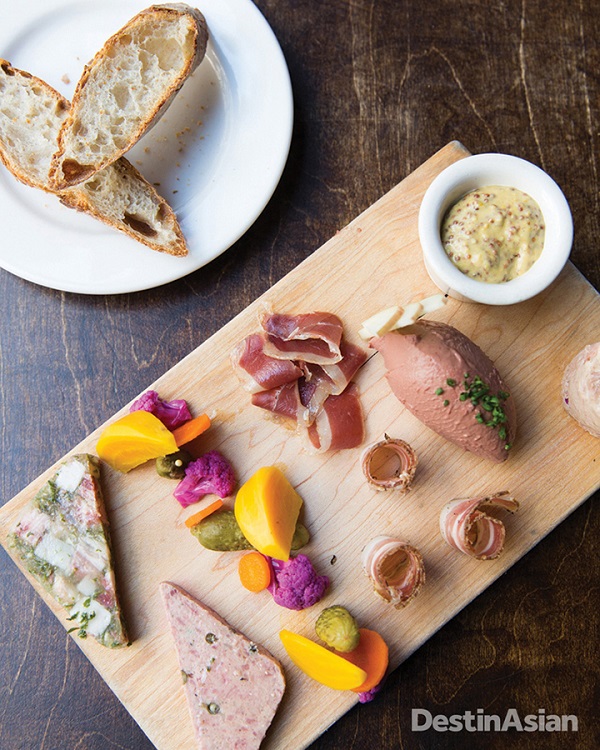 The charcuterie plate at Church and State includes duck prosciutto, country pate, and cured pork belly.
