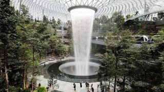 A 40-meter indoor waterfall is the centerpiece of Jewel Changi Airport.