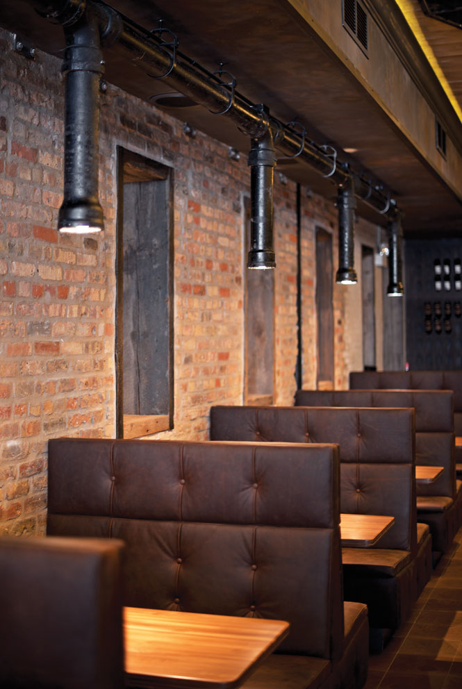 The industrial-style dining room at Trencherman, one of Chicago’s most anticipated openings.