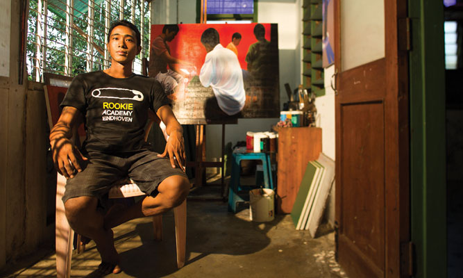 Artist Yan Naing Tun at his home studio near Yangon's Inya Lake.